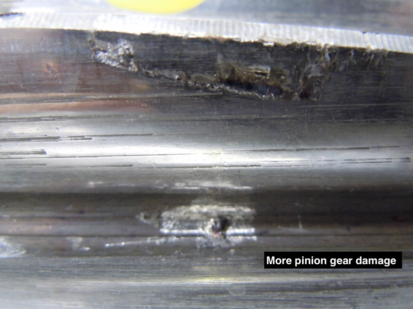 caterpillar pinion gear damage