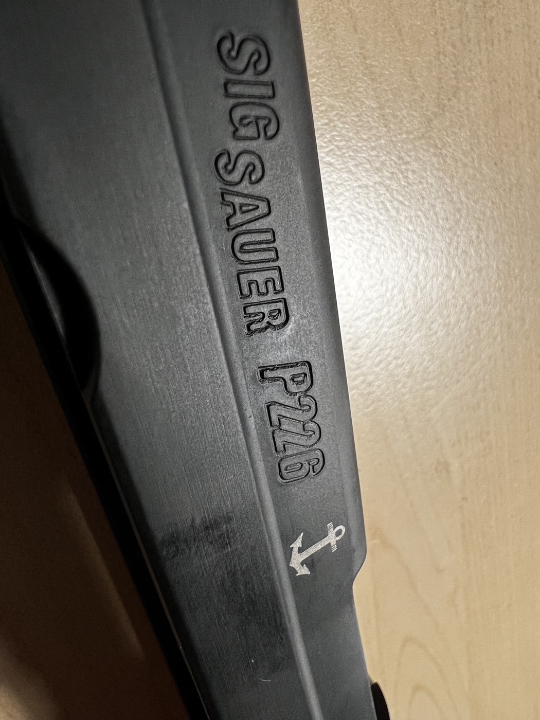 Sig Sauer P226 slide and barrel with SIG SAUER engraving after treatment, before reassembly
